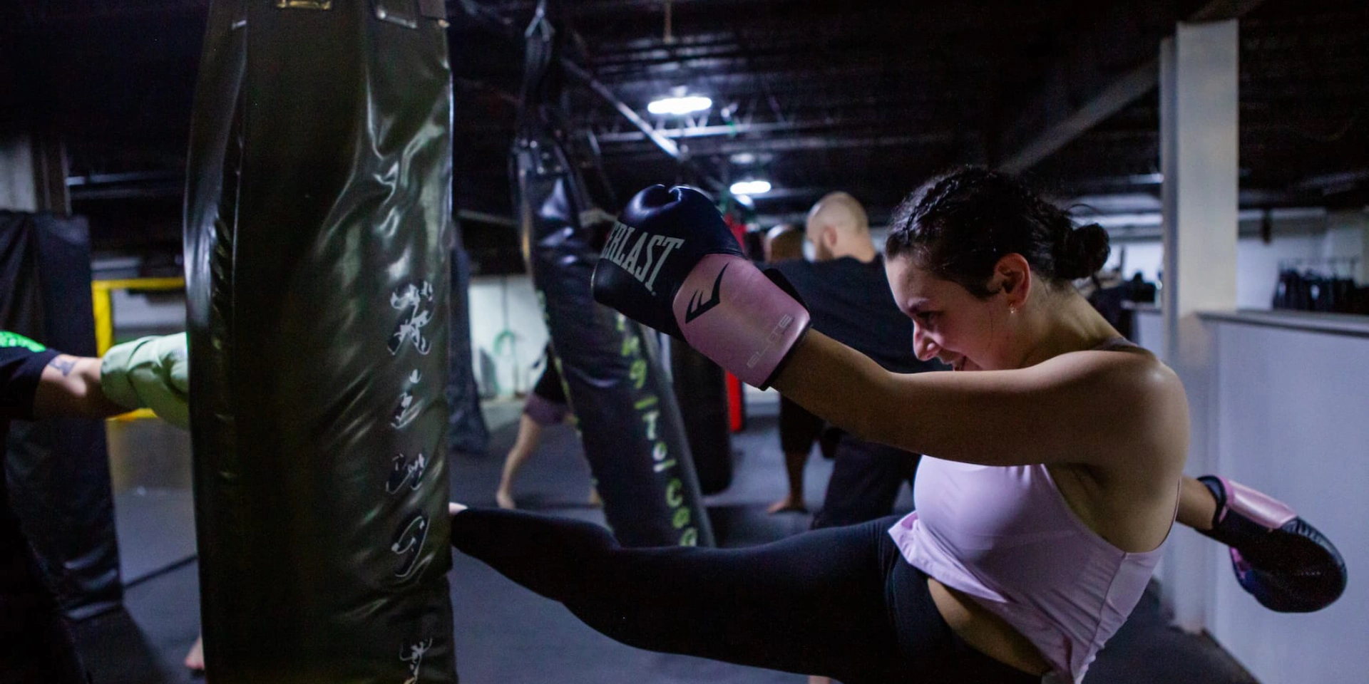 Level Up Gym People Hitting Bags